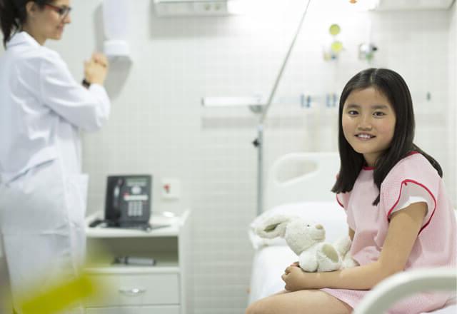 pediatrician-washing-hands-with-pediatric-patient